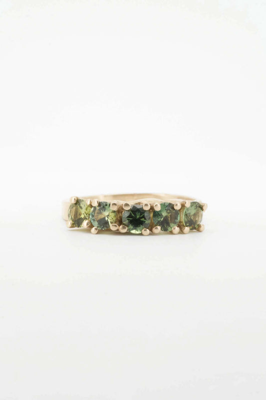 Green sapphires + 9ct yellow gold